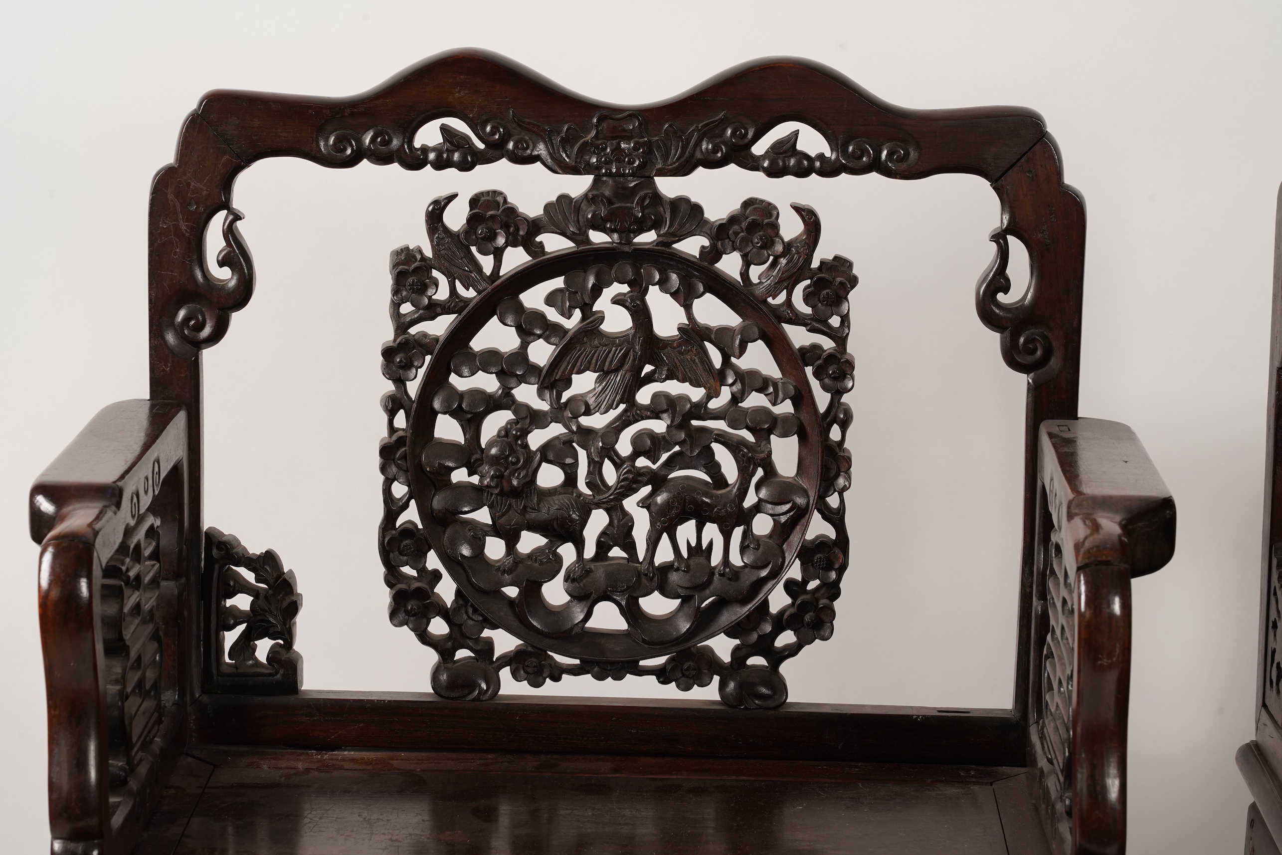 A pair of Chinese hongmu armchairs, late 19th century